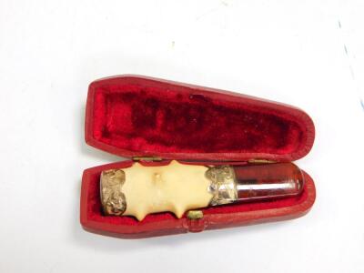 A Victorian meerschaum and amber cheroot holder, with silver mounts, foliate engraved, cased, Chester 1900.