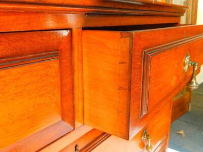 A Victorian mahogany chest of drawers, the bow fronted top raised over two short and three long graduated drawers, raised on a bow fronted plinth base, 104.5cm high, 113cm wide, 53.5cm deep. - 4