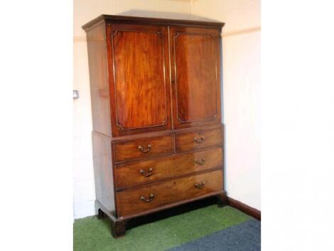 A George III mahogany press cupboard