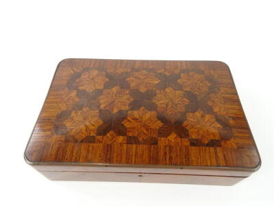 A 19thC kingwood and parquetry box, of rectangular form, with a slender domed lid, feather banded body and inlaid snowflake decoration, 6cm high, 22cm wide, 14cm deep. - 2