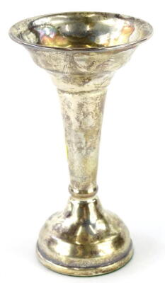 An Elizabeth II silver specimen vase, the circular top raised on a tapering stem and domed baize lined base, Birmingham 1973, 11cm high, 3oz all in.