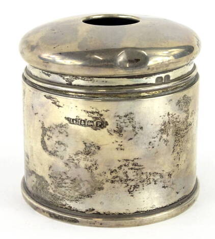 A George VI silver hair pot, of cylindrical form with removable lid with central opening, Birmingham 1939, 7cm high, 1.8oz.