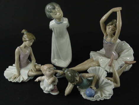 A 20thC Nao figure of a child, in flowing robes, printed marks beneath, 25cm high, a further Nao figure of a ballerina in recumbent pose holding an orb, and various others (a quantity).