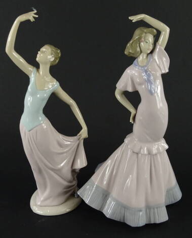 A 20thC Nao figure of a lady in flowing robes, with arm outstretched, on shaped base, and another (2).
