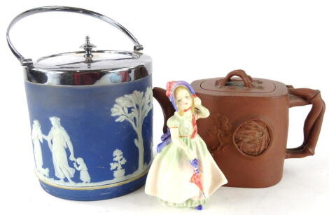 A Chinese Redware pottery teapot, of shaped form with barkwork spout and entwined handle, raised with flowers and seal to the body, with an entwined handle to the lid, seal mark beneath, 13cm high, a Royal Doulton figure Baby and a Wedgwood blue and white