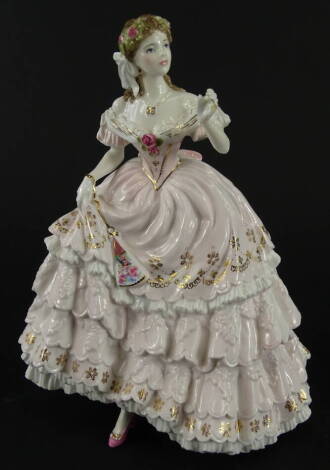 A Royal Worcester figure, The Fairest Rose, limited edition No. 1594/12500, printed marks beneath, 23cm high.