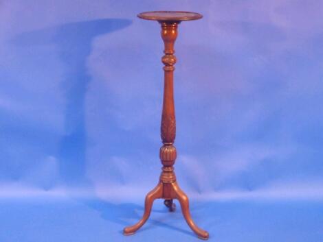 An early 20thC mahogany torchere stand