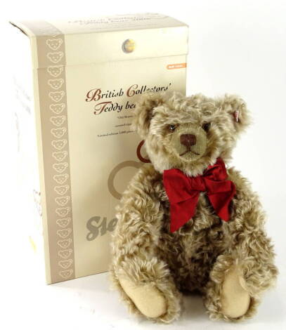 A Steiff British Collectors 2006 teddy bear Old Brown Bear, with red bow and growl action, 38cm high (boxed, with certificate).