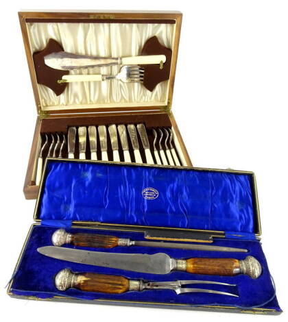 A cased horn handled carving set, in Smith & Daniels case, with sharpener, 42cm wide and a cased silver plated fish eating set, in fitted canteen, 5cm high, 35cm wide, 26cm deep (2).