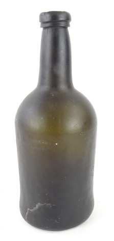 An 18thC green glass bottle, (AF), 24cm high.