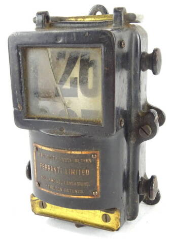 An early 20th Feranti Hollywood Lancashire electrical house meter, with adjustable material calendar in metal casing, 15cm high, 10cm wide, 9cm deep.