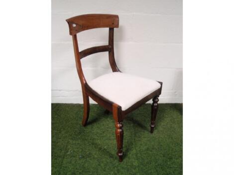 A set of four Regency rosewood bar back dining chairs