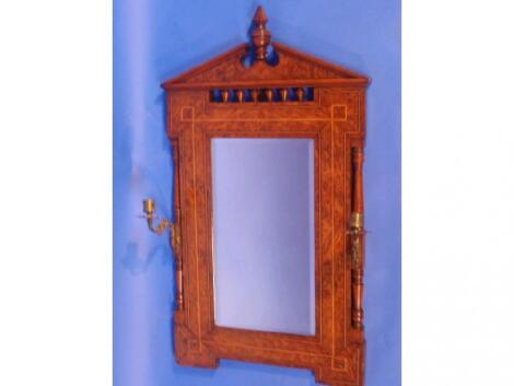 A burr walnut wall mirror with inlaid decoration