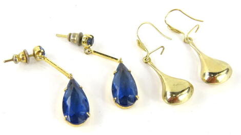 Two pairs of earrings, comprising a pair of club shaped examples, 3cm high, another tear drop pair claw set with blue stones, unmarked. (4)