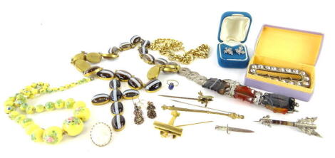 Various jewellery and effects, a polished stone cross, Christian Dior plated chunky necklace, 38cm long, costume brooch, pair of ivy leaf ear studs, small cameo brooch on a base metal setting, stick pin with aeroplane mount, various other items etc. (a qu