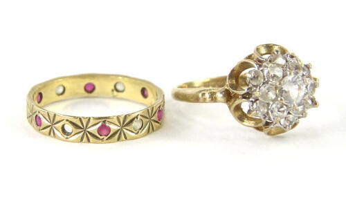 A ladies eternity ring, set with an arrangement of pink and white paste, marked 9ct, a 9ct gold dress ring set with a floral arrangement in paste, 3.7g all in (2).