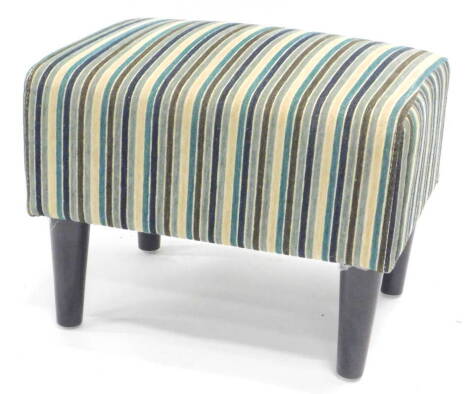 A Grabal Alok foot stool, of rectangular form, overstuffed in striped material, on tapering cylindrical legs, 33cm high, 42cm wide, 32cm deep.