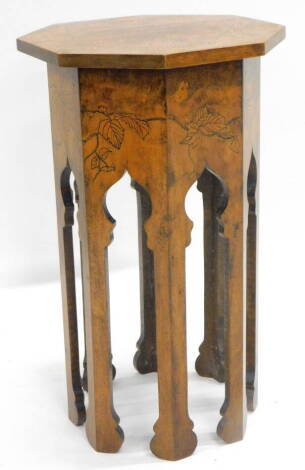 A Burmese type plant stand or side table, with a painted leaf and butterfly top, on shaped legs, 46cm high, 27cm wide, 27cm deep.