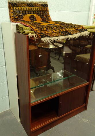 Two rugs, a glazed front display cabinet and another. (a quantity)