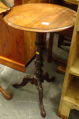 A Victorian mahogany occasional table, the circular top with a moulded edge on turned column and tripod base, 43cm wide.