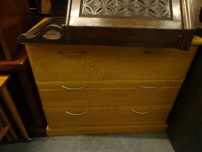 A four drawer metal filing cabinet, 134cm high, 47cm wide, 63cm deep and a lightwood chest of three long drawers. - 2