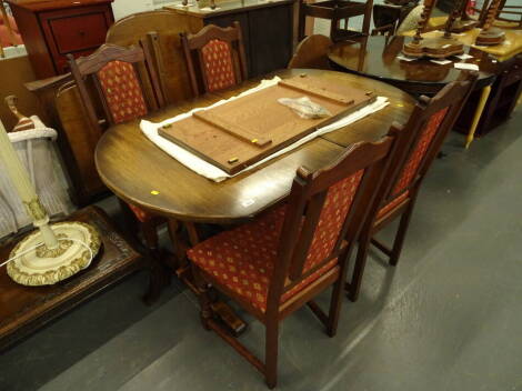 An Old Charm extending dining table and four chairs, 103cm high. (5)