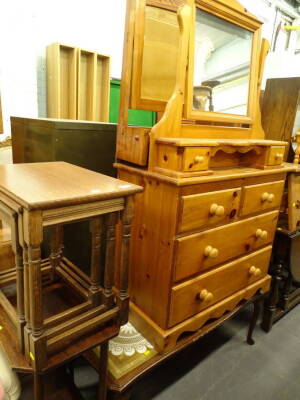 A nest of three oak finish tables, the largest 46cm high, 49cm wide, 32cm deep, an oak two tier table with canted top, pine dressing chest with mirror, of two short and two long drawers, mirror and coffee table (a quantity).