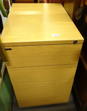 A three drawer office under desk filing cabinet, of rectangular form, with three drawers to the front.