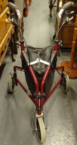 A Days folding mobility walker, 90cm high.