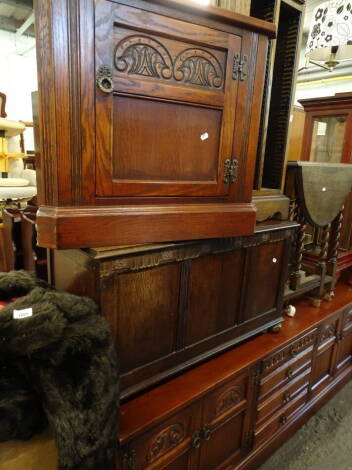 Various furniture, comprising an oak sideboard, drop leaf table, brass standard lamp, Priory style oak finish CD cabinet, 92cm high, 36cm wide, 21cm deep, a corner cupboard in the Priory style with a heavily carved door, and a TV stand (a quantity).