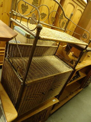 A pine blanket box, carved to the front "Millennium", 43cm high, 80cm wide, 40cm deep and a wicker side cabinet with metal framework and double cupboard beneath.