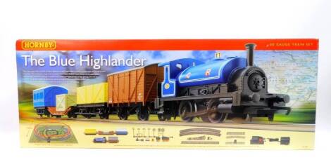 A Hornby The Blue Highlander OO-gauge train set, with Caledonian 0-4-0T locomotive, Vent van, 7 plank wagon, lowmac & load, four wheel coach, track pack A, instructions and track-mat, R1101, boxed .