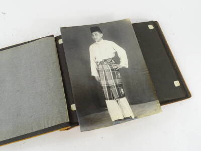 An early 20thC photograph album, showing black and white photographs of various figures in Singapore etc, some soldiers, a cabaret evening, 617 Squadron photographs showing aeroplane marked WH949, 11cm x 17cm, figure at the cockpit, various other black an - 2