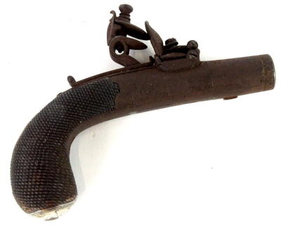 A late 18thC flintlock pocket pistol, by Brasher of London, with rare weather protected flash pan and concealed drop down trigger, the lock plates engraved with arms and signed Brasher London, with turn off steel barrel (3cm), the finely checkered grip wi