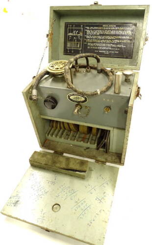 A Boost gauge 6C-658 calibrator, with crows foot emblem to the case, with interior operating instruments to the lid, 37cm high, 34cm wide, 21cm deep.