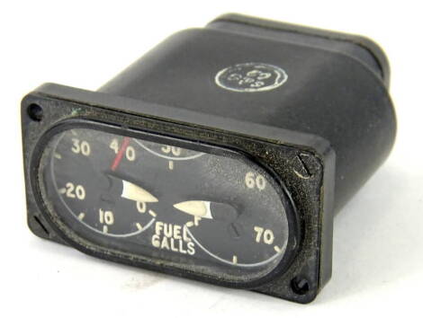 A vintage fuel content gauge, with Arabic numerals, typically used on Spitfires, 7cm wide.