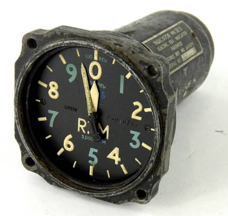 A vintage dial tachometer, with Arabic numerals marked rpm 5000, 7cm diameter, as used on Merlin engines, Spitfires, Hurricanes, and Lancasters.