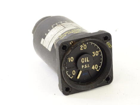 A vintage aeroplane engine dial tachometer by Smiths, with Arabic dial marked oil PSI number 61467437, 7cm high.