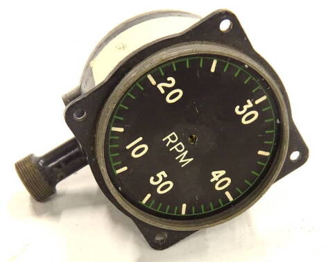 A vintage aeroplane rpm dial, in metal casing stamped 64/1300AM, probably from a Spitfire or a Hurricane, 13cm high.