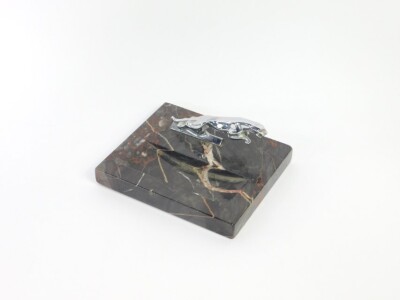 A Jaguar car mascot mounted Ashburton marble ashtray, by The Birmingham Medal & Badge Co Ltd, 18cm W, 15.5cm D.