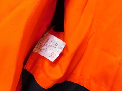 A British Rail jacket, with turquoise trim, together with a wool overcoat, and a blouson jacket with orange lining, size L. (3) - 2