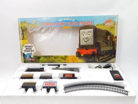 A Hornby OO-gauge World of Thomas The Tank Engine electric train set, Devious Diesel, including locomotive, tender, track, etc., R135, boxed.