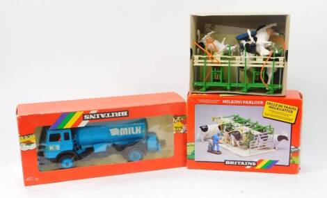 A Britains die cast milk tanker 9604, together with a milking parlour 4710, boxed. (2)