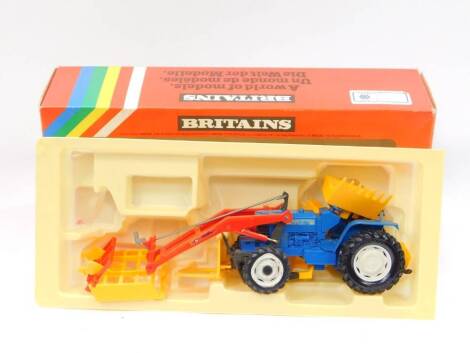 A Britains die cast Ford tractor with loader, TW-20 9584, boxed.