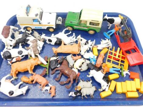 Britains animals vehicles and accessories, including cattle square bales, farmer, workers, police Landrover, County landrover, etc. (quantity)