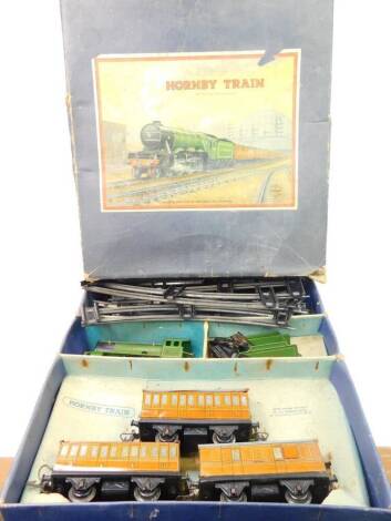 A Hornby Meccano Trains O-gauge tin plate train set, including a locomotive 1842, LNER tender, three carriages 3113, etc. no 501, boxed.