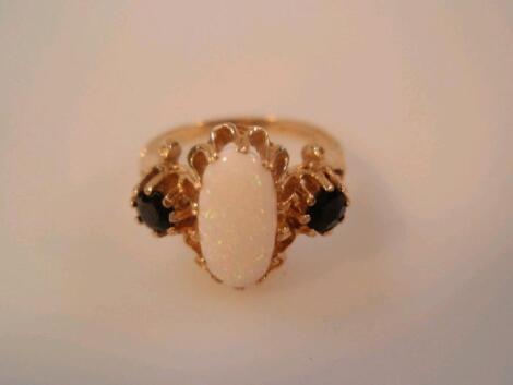 A ladies stone set dress ring