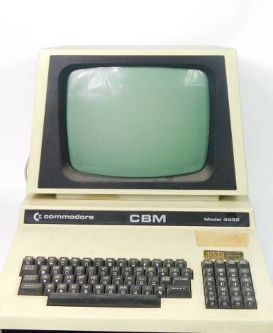 A vintage Commodore CM4032 computer with built in monitor, 43cm high, 43cm wide, 51cm Deep.