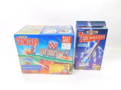 A Matchbox Stingray Marineville Headquarters action playset, SR210, together with an Electronic Thunderbird 1 with motorised wings and electronic light and sound, boxed. (2)