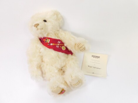 A Merrythought Regal Splendour Coronation bear, 1953-2003, with sash, labelled and stitched under feet, with certificate, 33cm high.